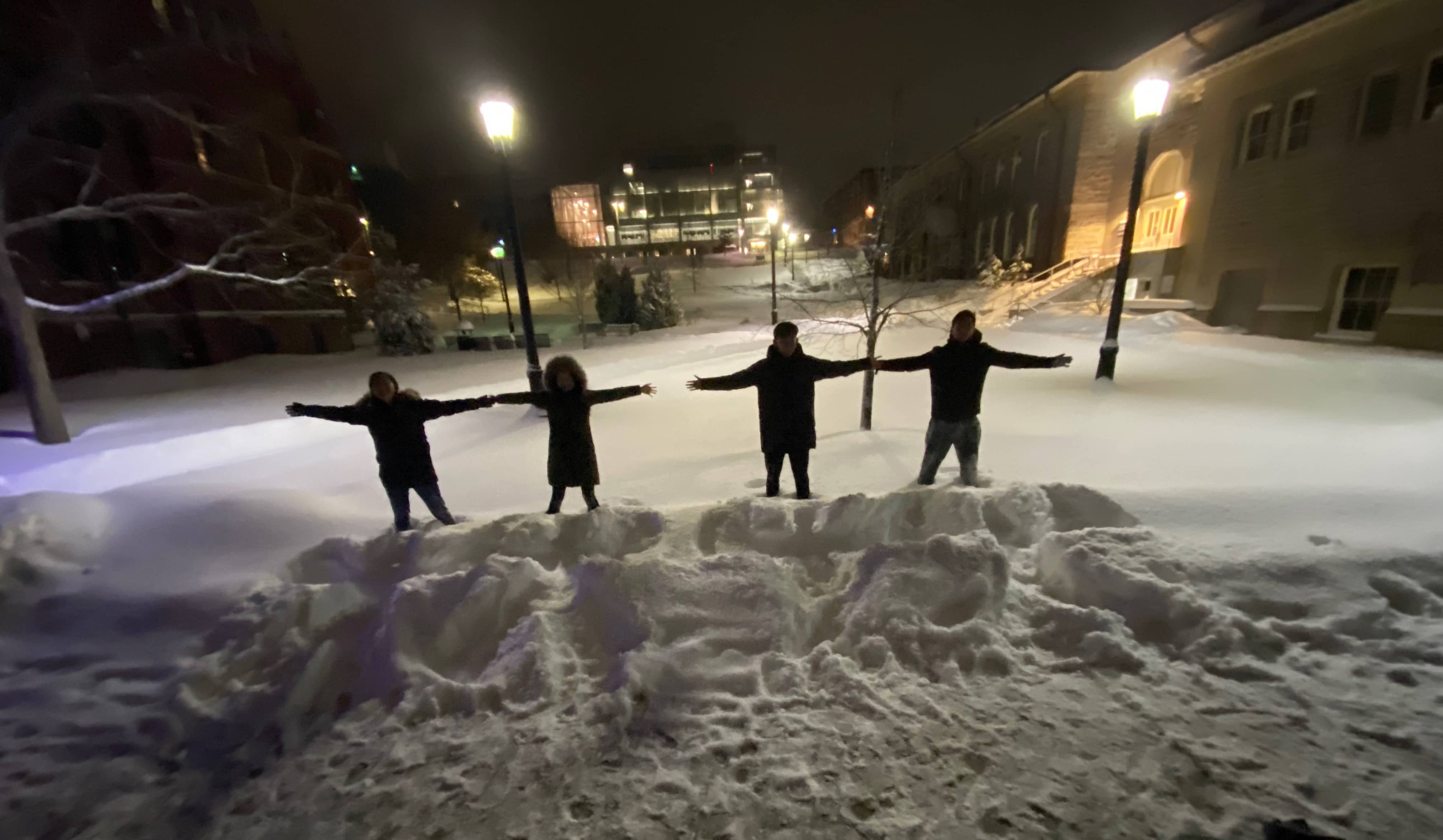 Making snow angels together